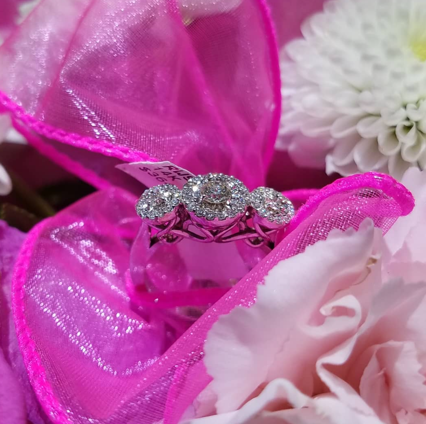 Three-stone halo diamond ring in 14K white gold