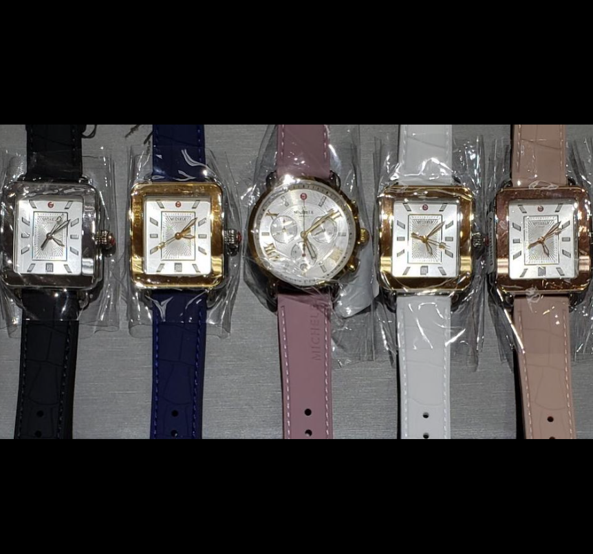 Five square-case watches with assorted leather straps